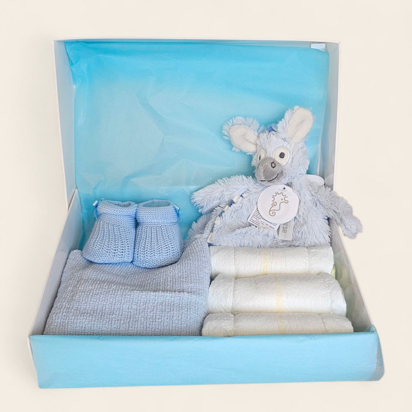Kraamcadeau blauw met Happy Horse Donkey Dallas, spuugdoekje slofjes en pampers