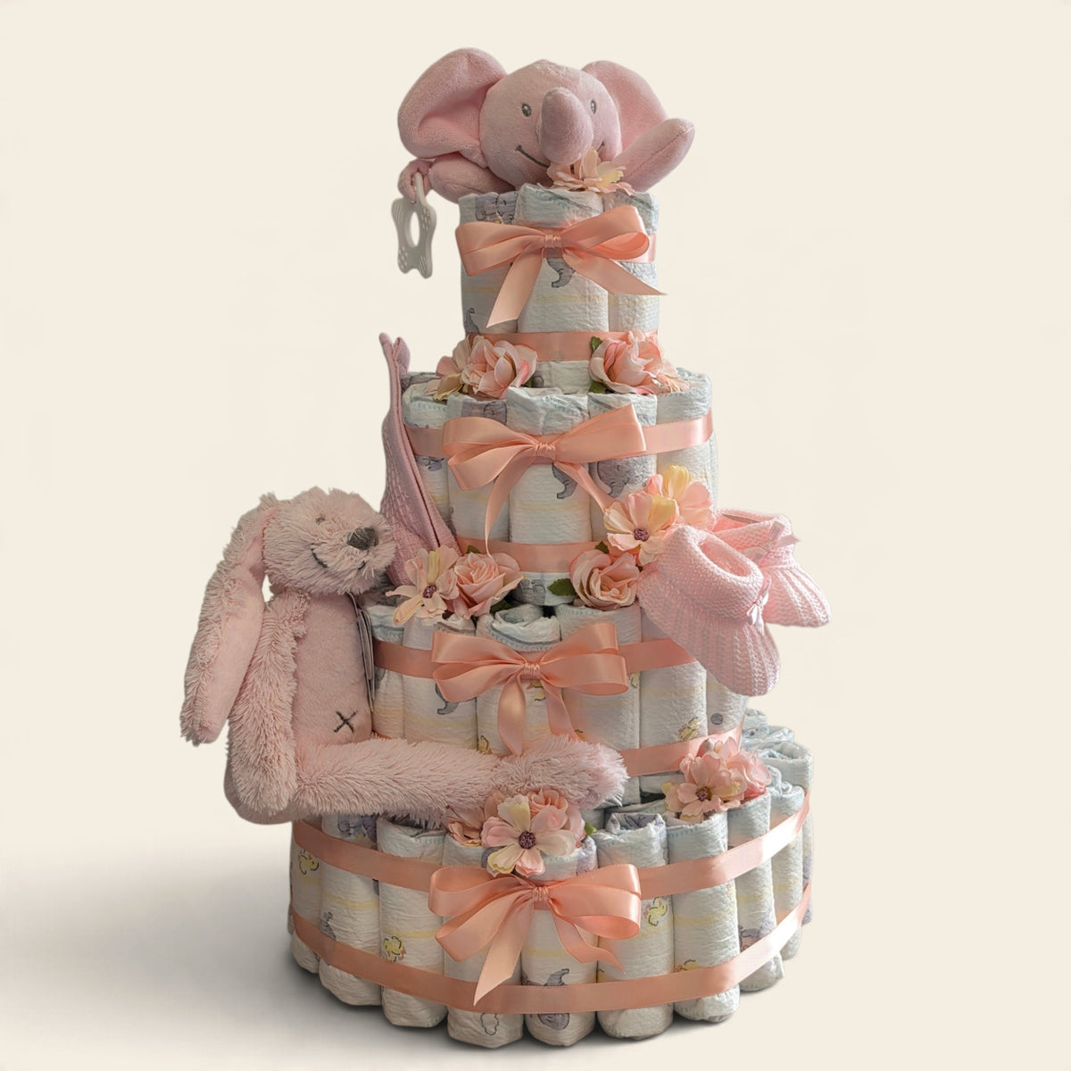 mega roze luiertaart 107 luiers met happy horse knuffel en olifant tuttle